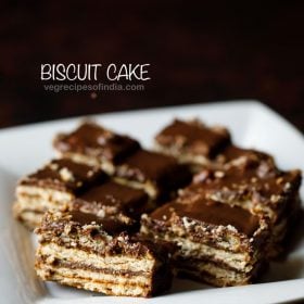 no bake biscuit cake served in a white tray with text layovers