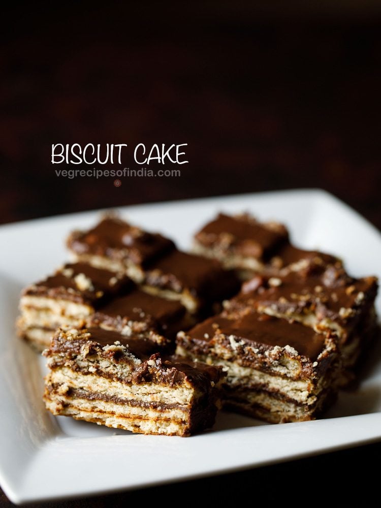 no bake biscuit cake served in a white tray with text layovers.