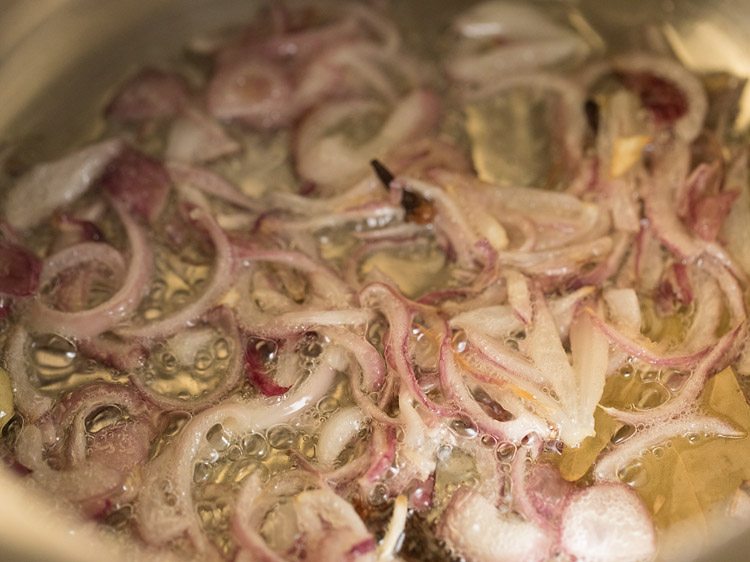 sautéing onions with spices. 