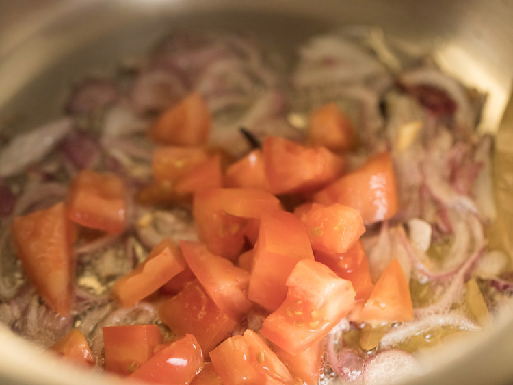 chopped tomatoes added to the onion mixture. 