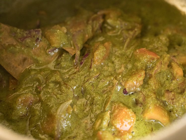 sautéing masala paste with the onion-tomato mixture. 