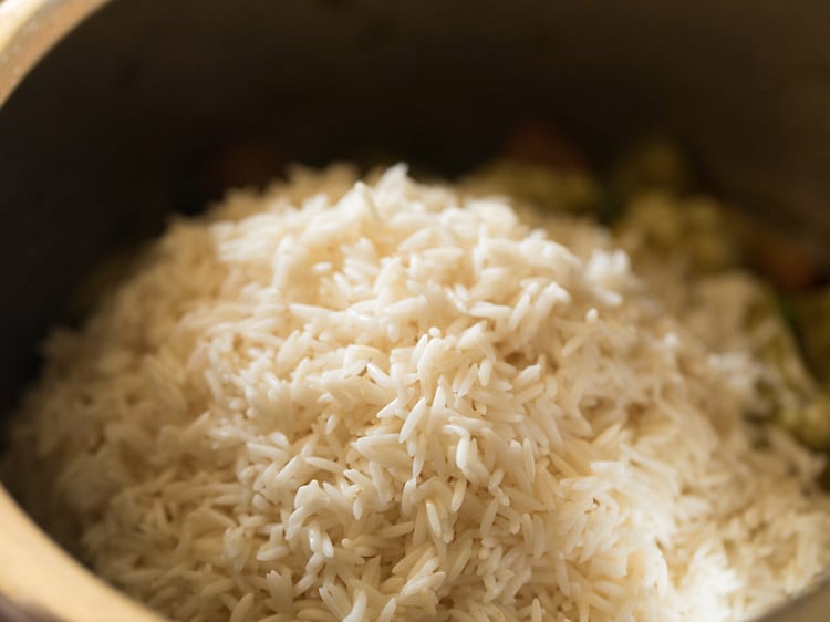 drained rice added to the vegetable mixture. 