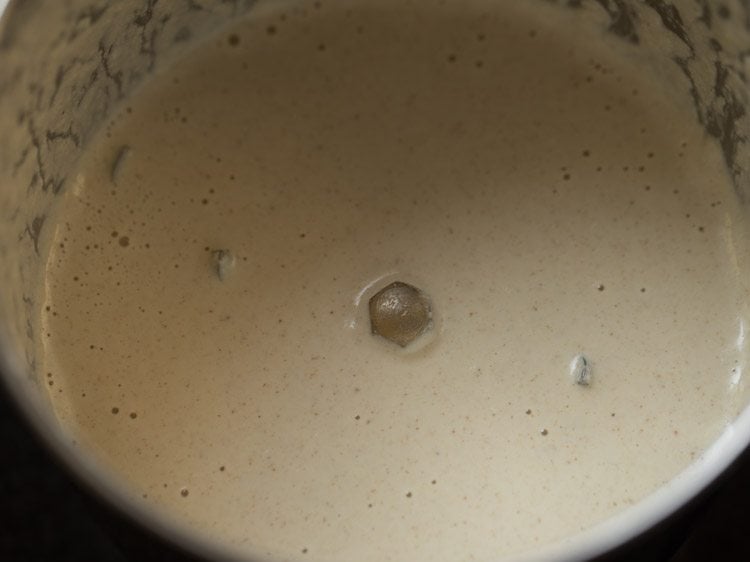 pureed coconut, chili, and spice mixture in mixing bowl