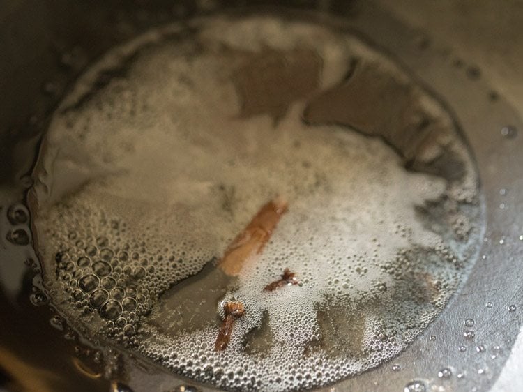 top shot of oil heating in saucepan