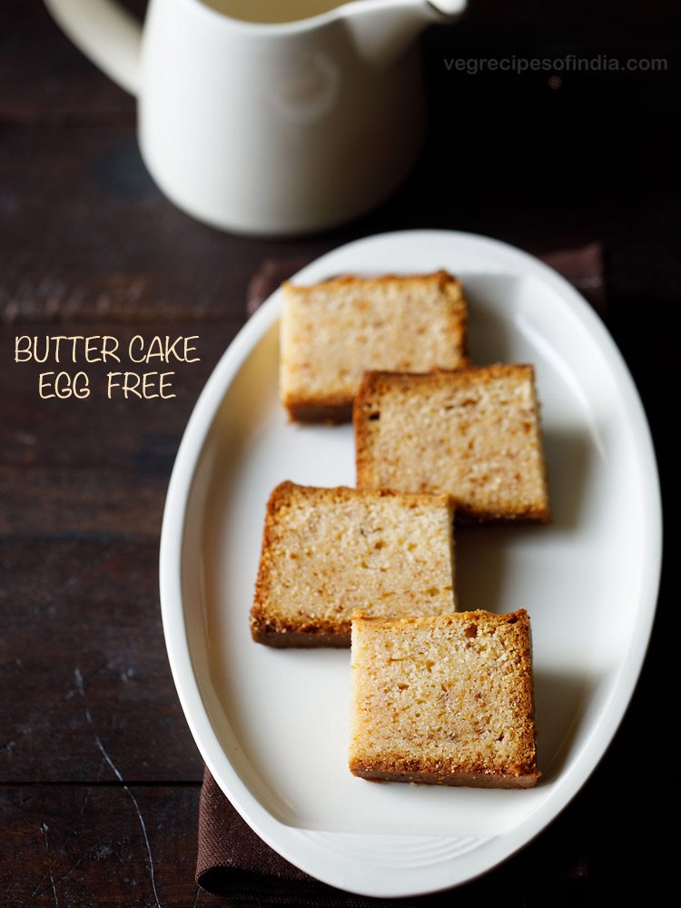 small squares of butter cake on white oval plate.