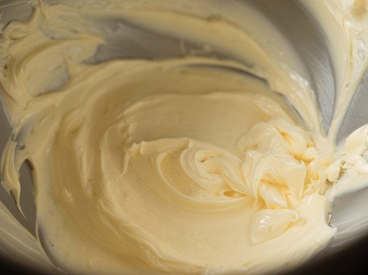 fluffy and light butter in stand mixer bowl.