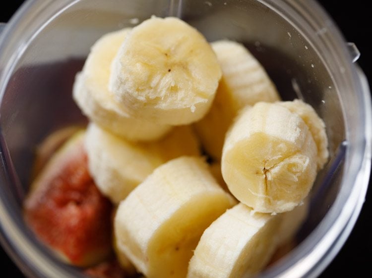 sliced bananas added to the blender jar
