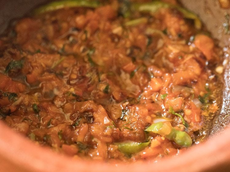 sauteed onion-tomato mixture in the pan