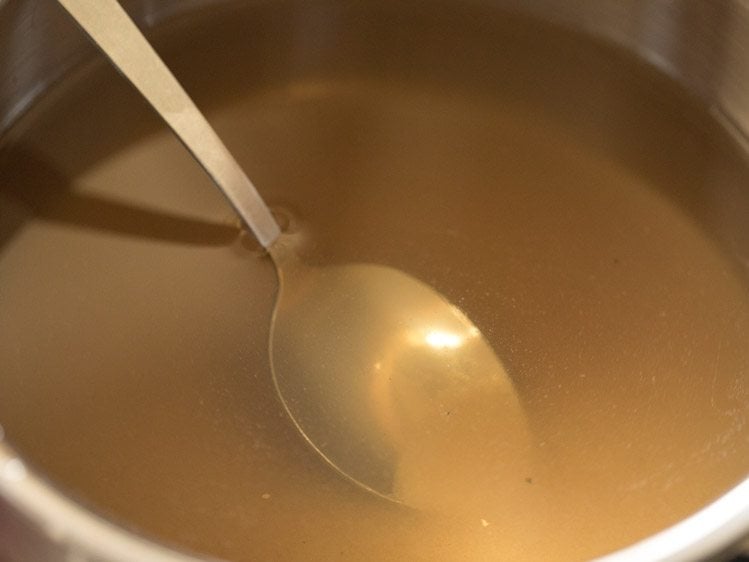 stirring solution to dissolve sugar. 