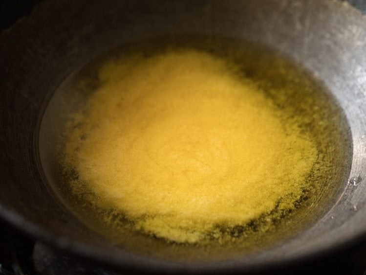 heating ghee in heavy bottomed pan. 