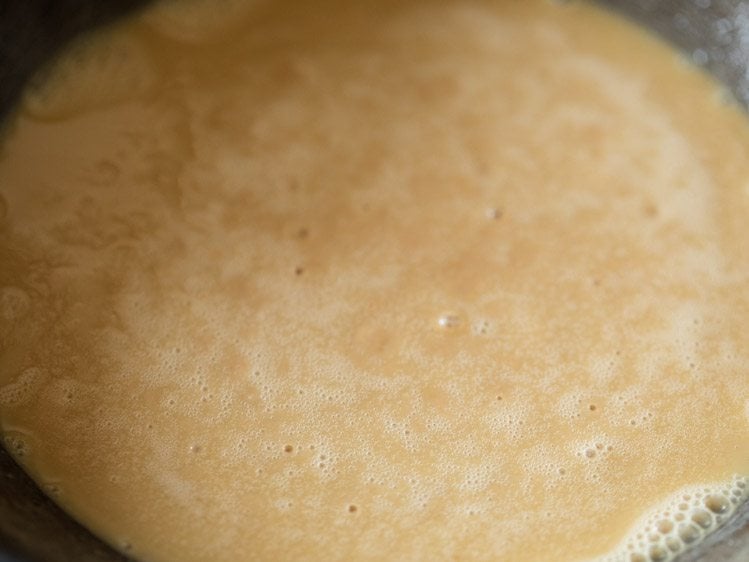 frying whole wheat flour in ghee. 