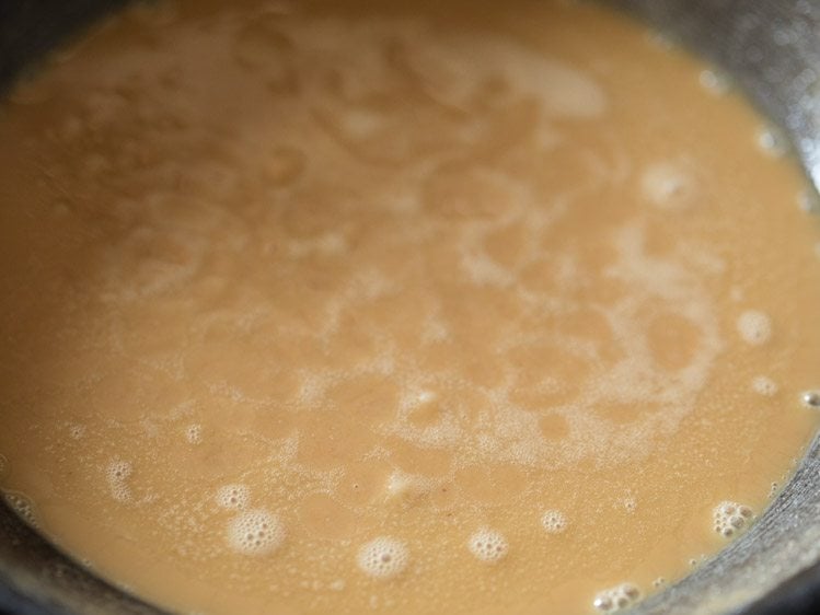 frying whole wheat flour in ghee till color changes. 