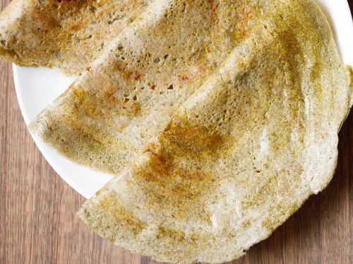 moong dal dosa served on a plate