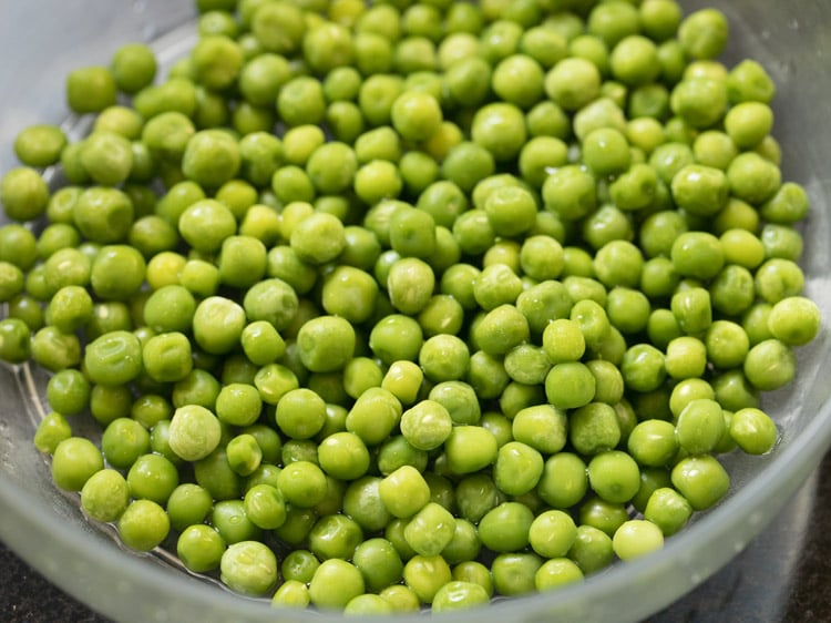 rinsed fresh green peas for shingara. 