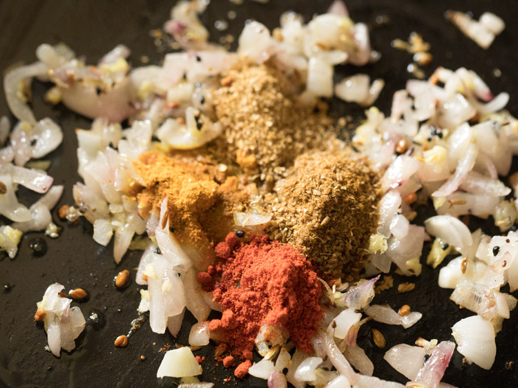 spice powders added to the onions. 