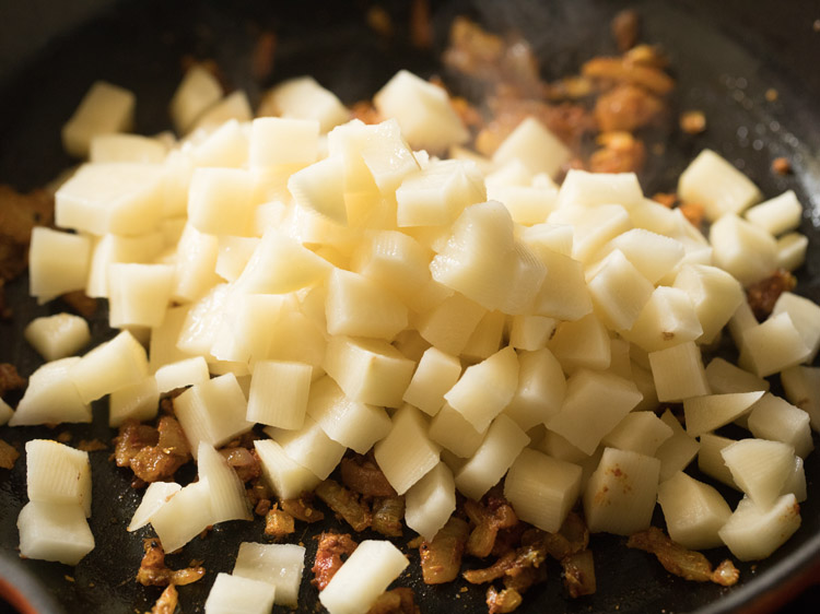 chopped potatoes added to the onions. 