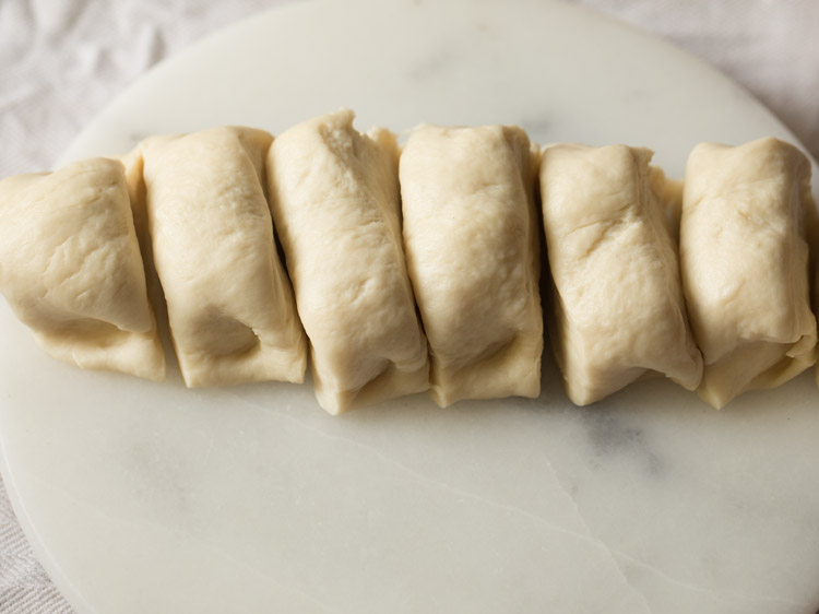 dough log cut into 6 pieces. 