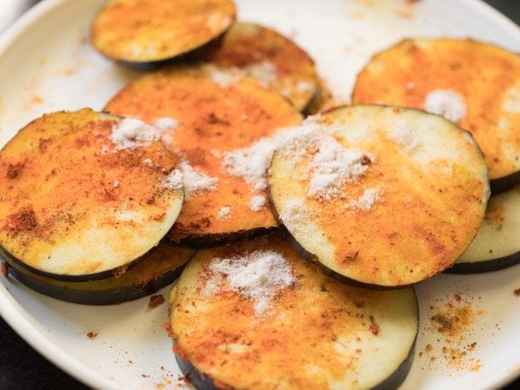 salt sprinkled on brinjal slices. 