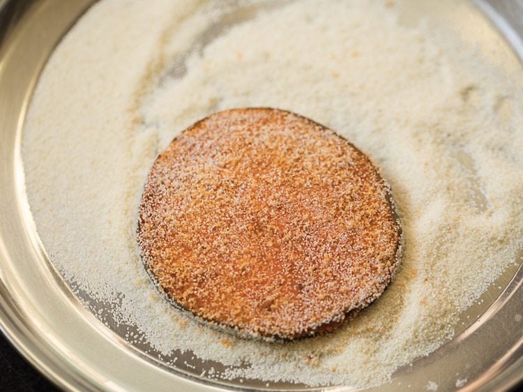 brinjal slice evenly coated with rava. 