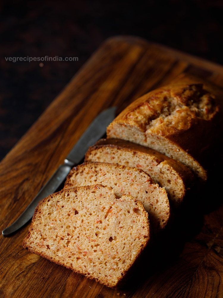 carrot cake sliced and kept on a wooden board