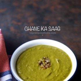 chane ka saag served in a blue rimmed white bowl with text layovers.