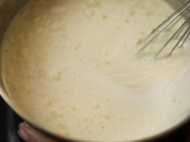 mixing liquid ingredients with a wired whisk