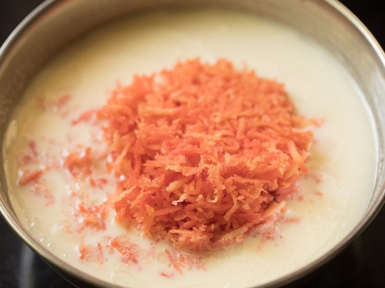 grated carrot added to mixed liquid ingredients