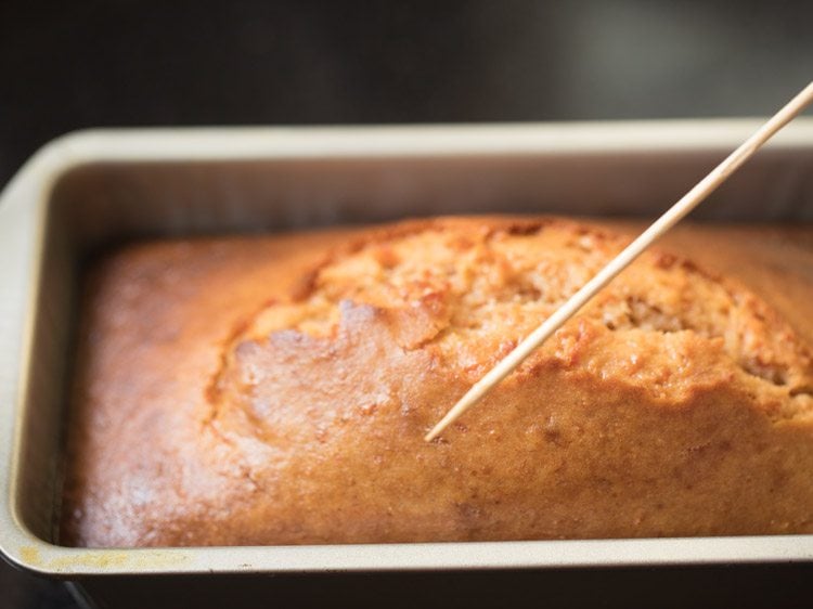 checking crumb with a wooden skewer