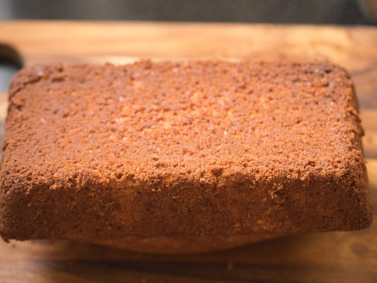 eggless carrot cake inverted on chopping board