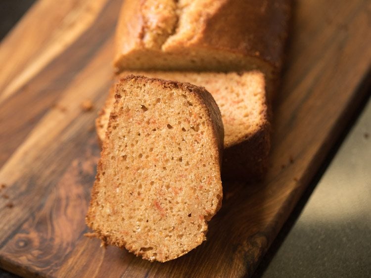 eggless carrot cake slice on chopping board