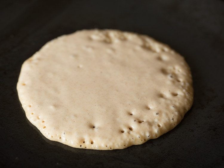 cooking pancakes made without eggs on skillet.