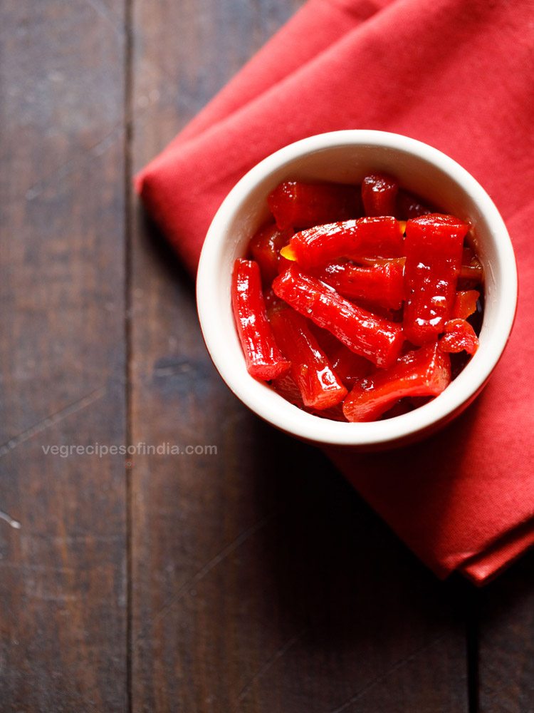 gajar ka murabba served in a small white bowl. 