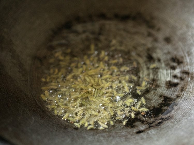 fennel seeds added to hot oil. 