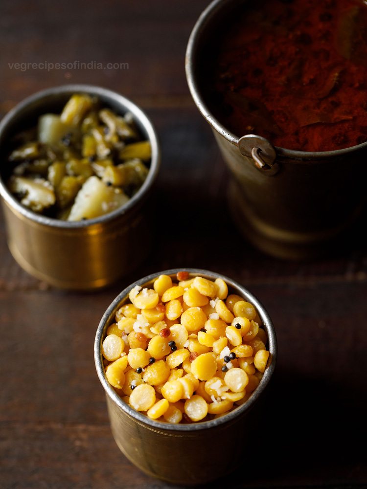 chana dal sundal served in a copper vessel with text layover. 