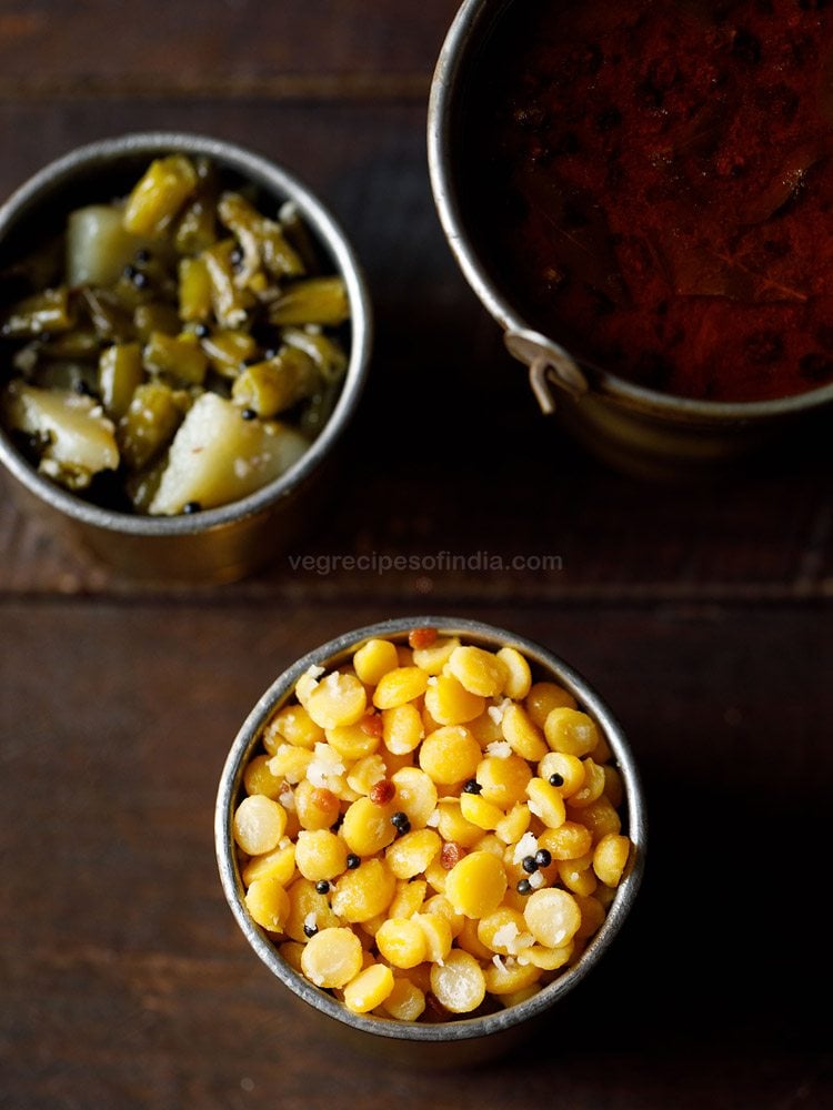 chana dal sundal served in a copper vessel with text layover. 