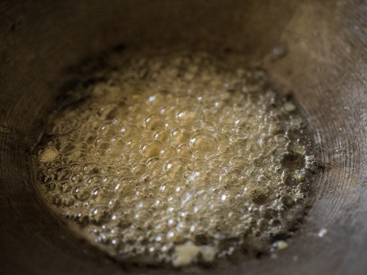 sautéing ginger garlic in hot oil. 