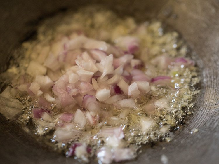 chopped onions added to oil. 