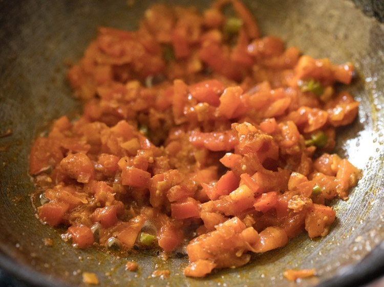 tomatoes and green chilies mixed well. 