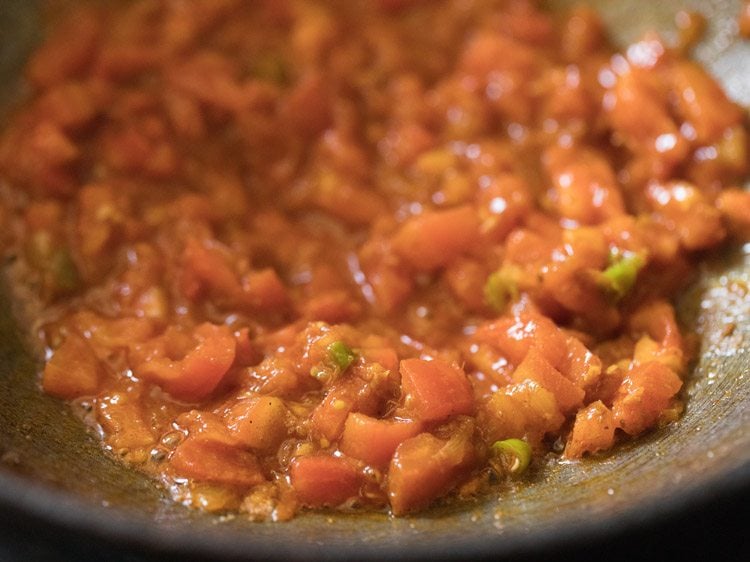 salt mixed well in the onion-tomato masala. 