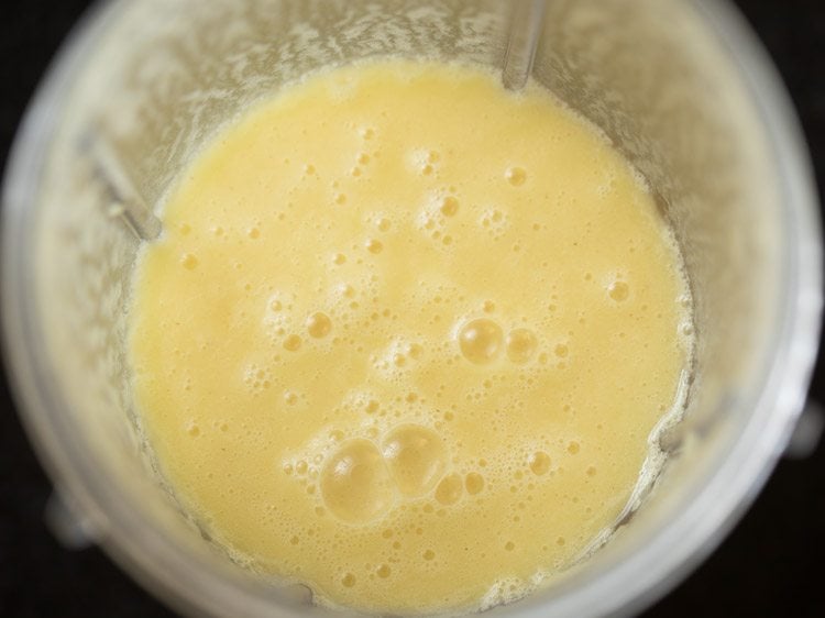pineapple smoothie mixture is smooth without any chunks. 