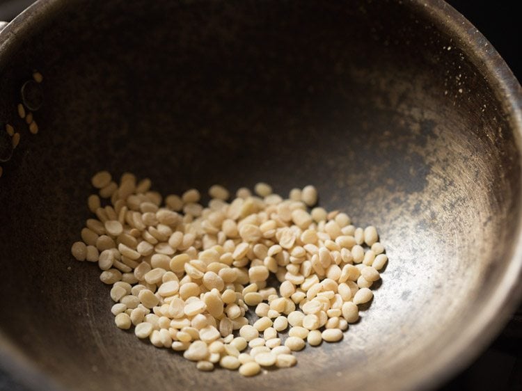 roasting urad dal.
