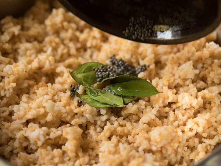 tempering added to the rice mixture.