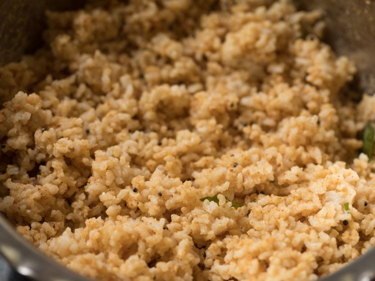 tempering mixed well with the rice mixture.