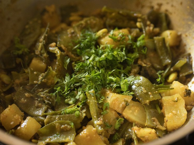 chopped coriander leaves added to cooked sabji. 