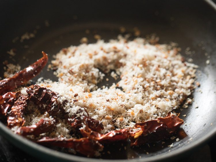 roasting ingredients in the pan.