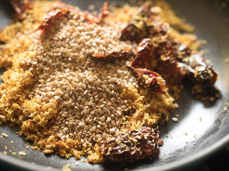 white sesame seeds added to the roasted coconut mixture. 