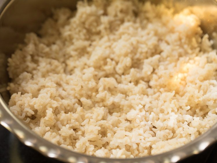 cooling pressure cooked rice in a bowl. 