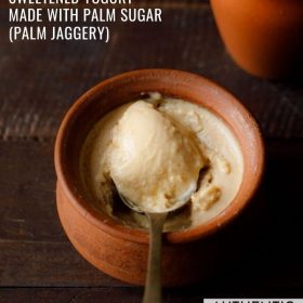 mishti doi served in an earthen bowl with some scooped in a spoon and text layovers.