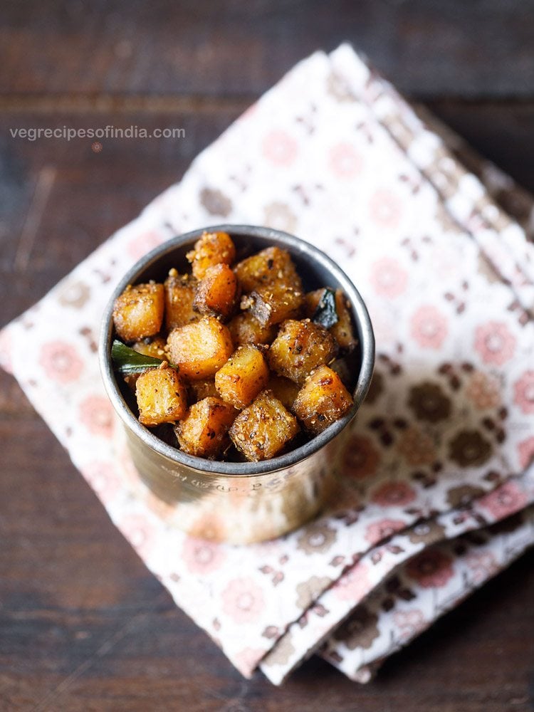 vazhakkai varuval served in a steel container. 