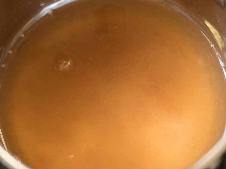 water added to tamarind pulp for coconut milk rasam. 